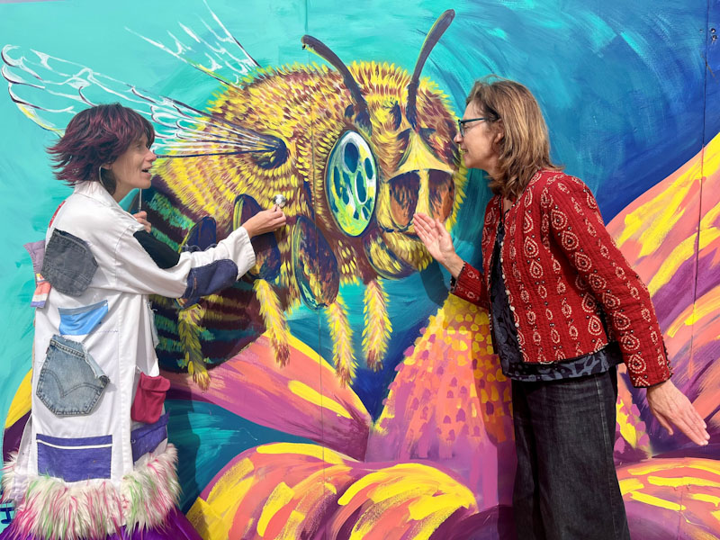Dr Pockets and Zsuzsi Soboslay with artwork