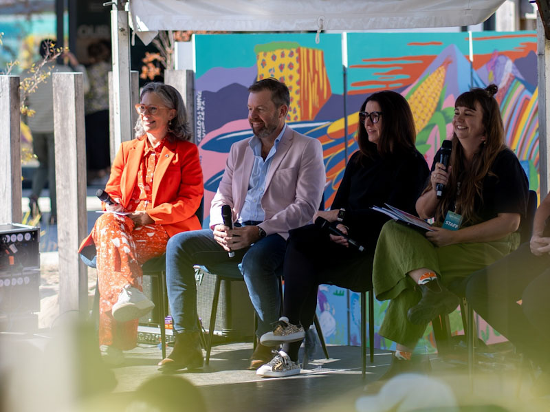 People presenting on stage