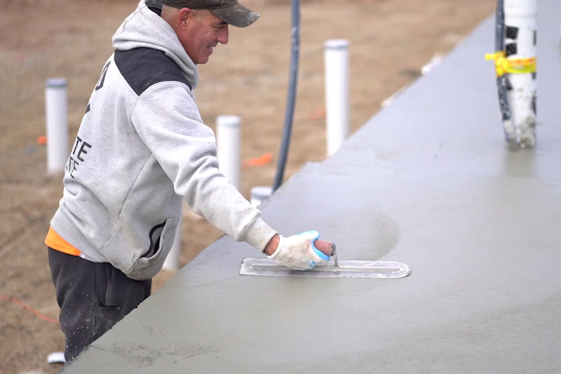 Low carbon concrete Man working with concrete